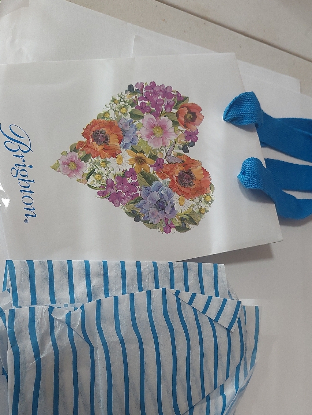 Brighton Floral Heart Gift Bag with Blue Logo and Turquoise Ribbon With Tissue .